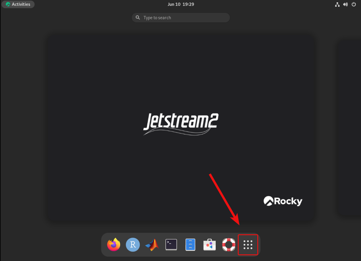 A screenshot highlighting the location of the "Show Applications" button in Rocky 8
